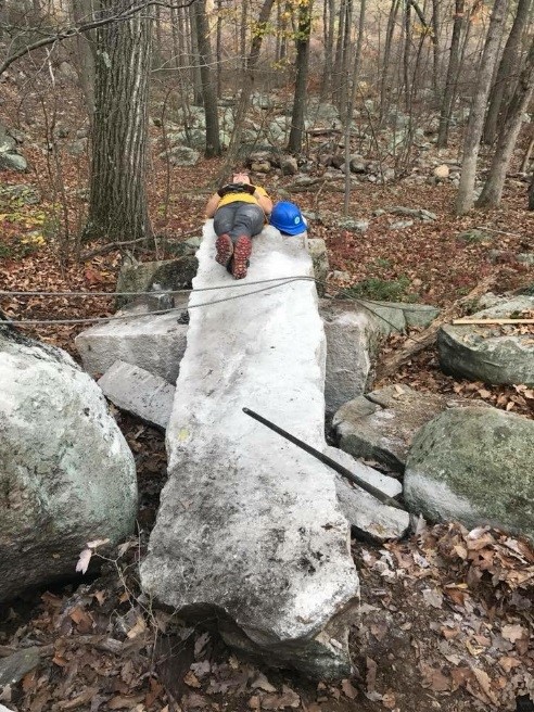 Crew member Sam taking a well-deserved break in Sterling Forest State Park.