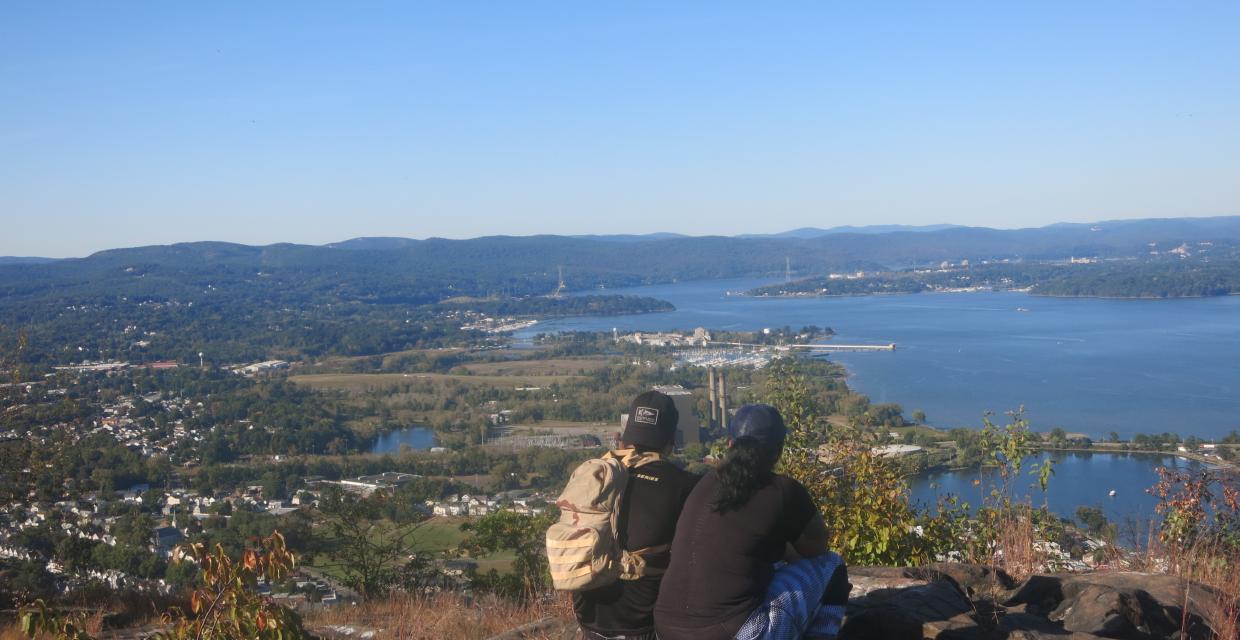 Hikers taking in the view from the summit of High Tor - Photo by Daniel Chazin